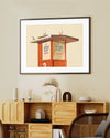 Framed artwork of a life tower with 3 seagulls standing on it on a wall above a wooden console