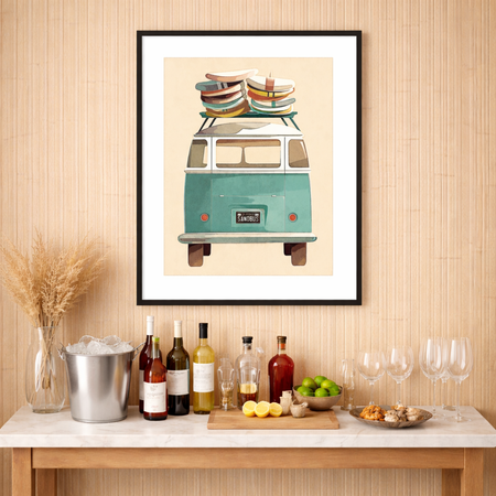 Vintage VW bus with surfboards stacked on the roof rack, coastal surf art print displayed in a bright beach house interior